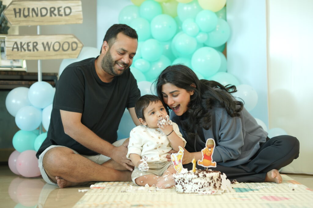adorable baby smiling during a soft pastel themed photoshoot